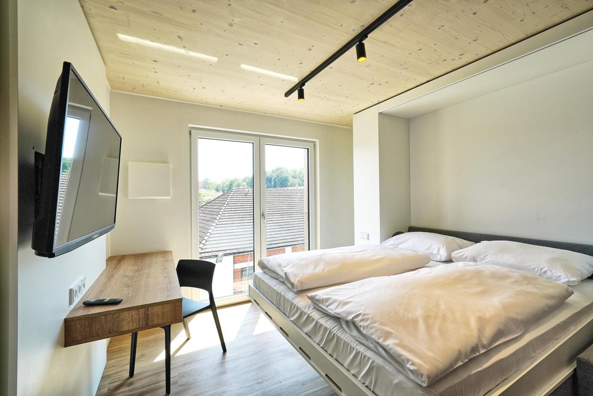 Timber One Boardinghouse Dorfen Aparthotel ภายนอก รูปภาพ